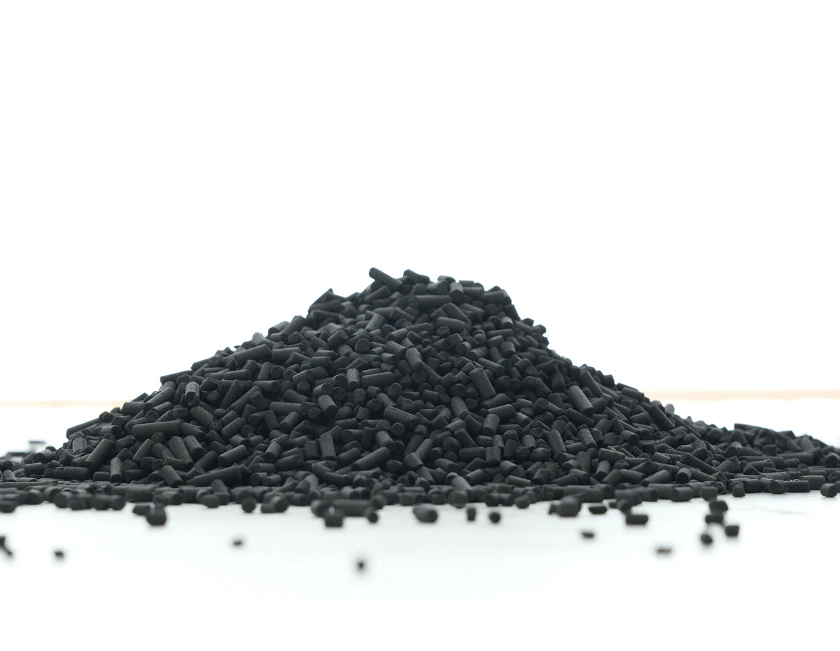 A mound of loose activated carbon pellets